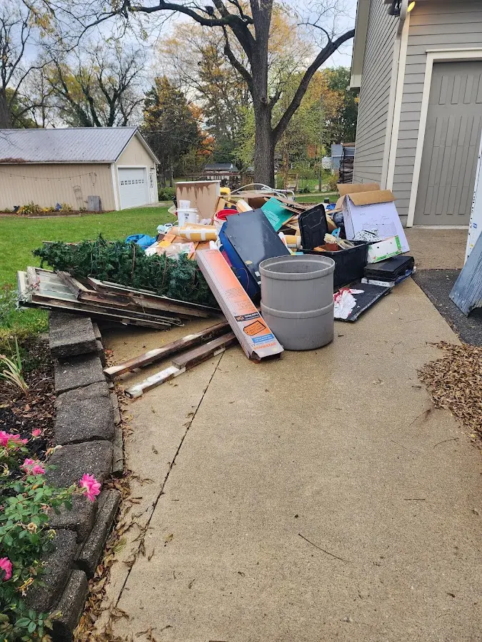 Dumpster being loaded with debris for Commercial Dumpster Rental in Union City